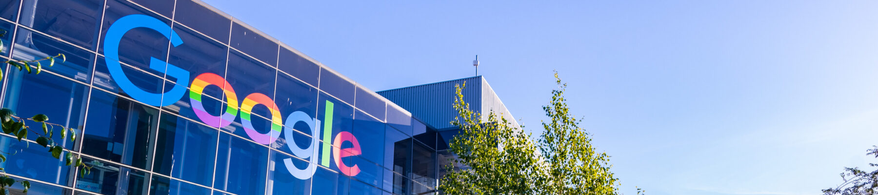 June 8, 2019 Mountain View / CA / USA - Google office building in the Company's campus in Silicon Valley; The "double o's" of the logo are decorated in rainbow colors in honor of LGBTQ Rights