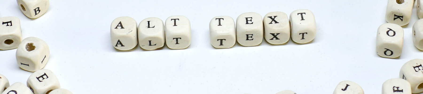 online marketing term on white background wooden abc alt text