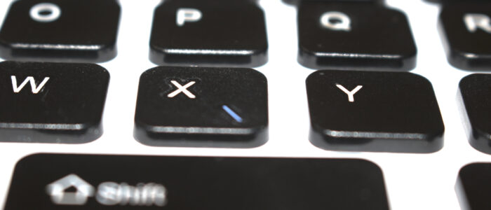Computer Keys Keyboard Scattered on White Background