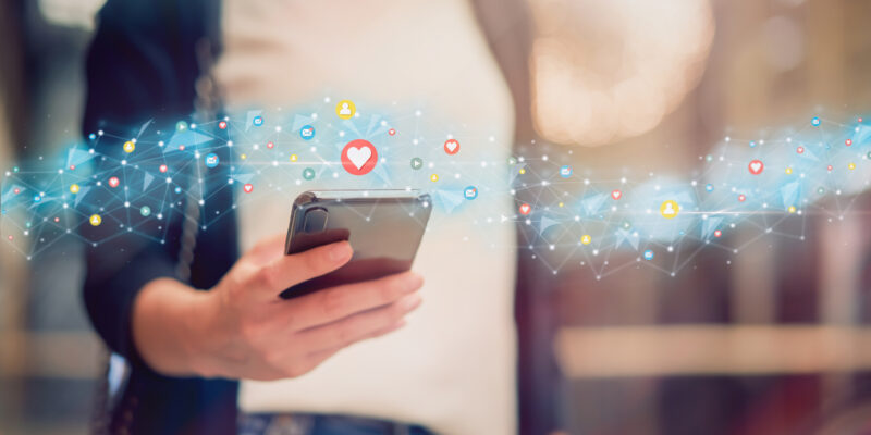 Social media and digital online concept, woman using smartphone and show technology icon.